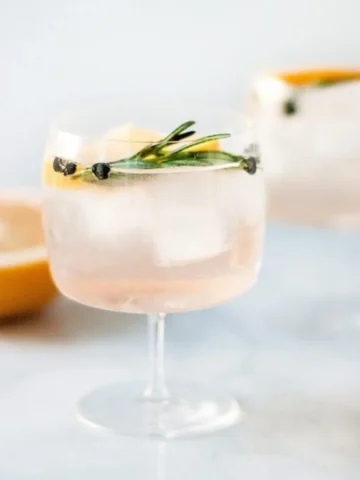 Grapefruit Elderflower Spanish Gin and Tonics - Looking for some tasty and colorful cocktail inspiration? Look no further than our round-up of the 10 most delicious pink cocktails! From refreshing fruity blends to classic favorites, there's something for every taste in this list. So why not mix things up and try one of these pretty pink drinks at your next gathering?