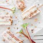 Rhubarb Yogurt Popsicles with Granola Recipe; This delicious recipe combines tangy rhubarb with creamy Greek yogurt, creating refreshing popsicles that are perfect for summertime. With the addition of crunchy granola, these popsicles provide a delightful texture that will leave you craving for more. Try this easy and healthy recipe today!
