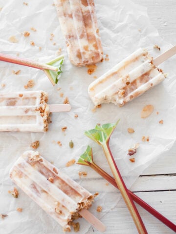 Rhubarb Yogurt Popsicles with Granola Recipe; This delicious recipe combines tangy rhubarb with creamy Greek yogurt, creating refreshing popsicles that are perfect for summertime. With the addition of crunchy granola, these popsicles provide a delightful texture that will leave you craving for more. Try this easy and healthy recipe today!