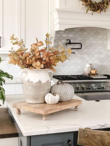 Fall Kitchen Decor Must Haves; Get ready for fall with my list of 10 must have kitchen decor items for 2023! From seasonal tablecloths to fall kitchenware and fall-scented soaps, these items will transform your kitchen into a warm and inviting space perfect for enjoying the season.Fall Kitchen Decor Must Haves; Get ready for fall with my list of 10 must have kitchen decor items for 2023! From seasonal tablecloths to fall kitchenware and fall-scented soaps, these items will transform your kitchen into a warm and inviting space perfect for enjoying the season.