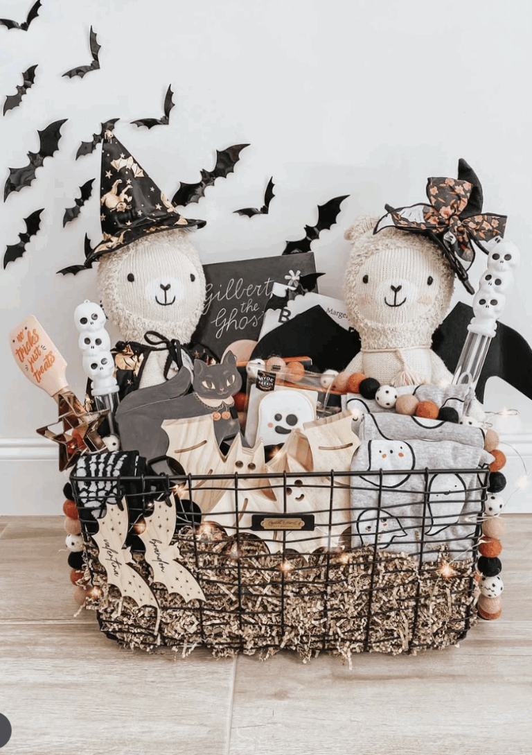 Halloween boo basket idea for kids featuring stuffed animal llamas, spooky treats, wooden ghost bags, and Halloween-themed pajamas.