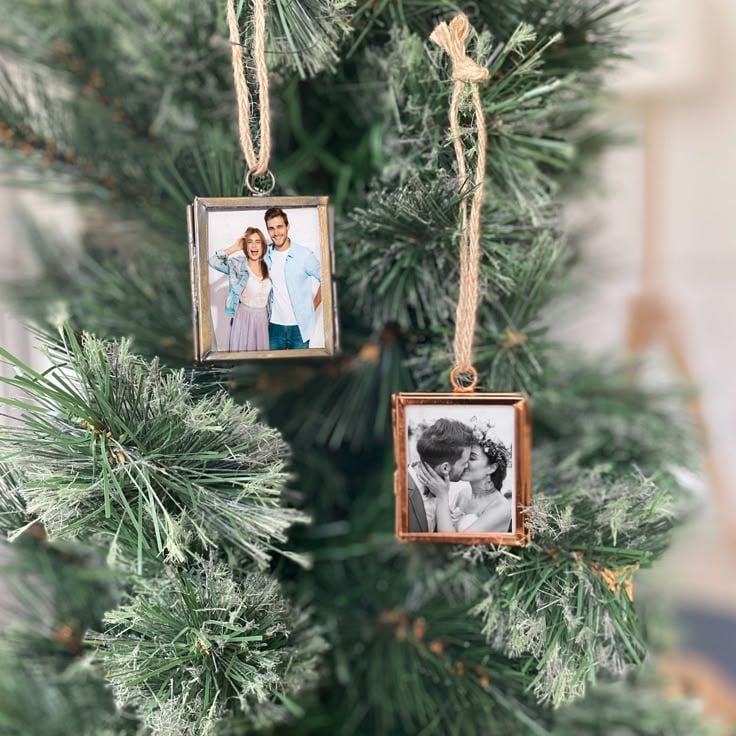 DIY mini picture frame photo ornaments hanging on a Christmas tree, featuring family and couple photos in small gold and bronze frames tied with twine