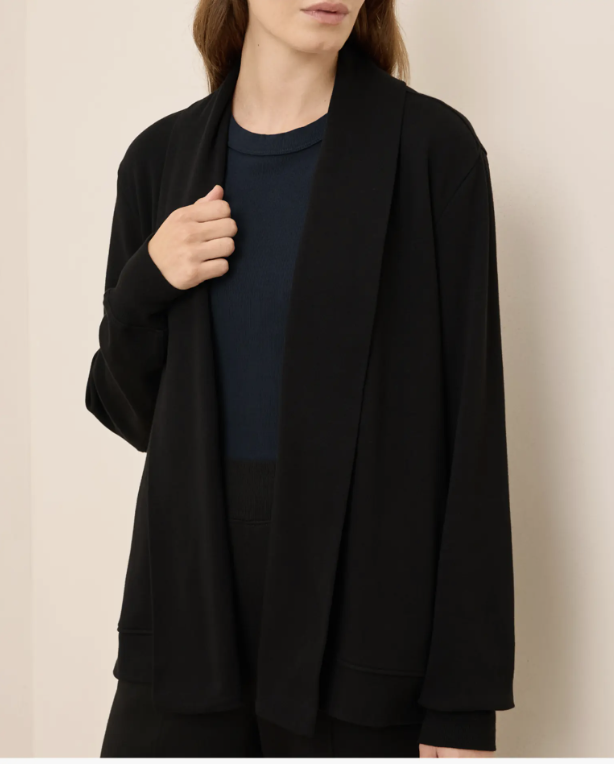 woman wearing black sustainable drape cardigan made from eco-friendly non-toxic fabric