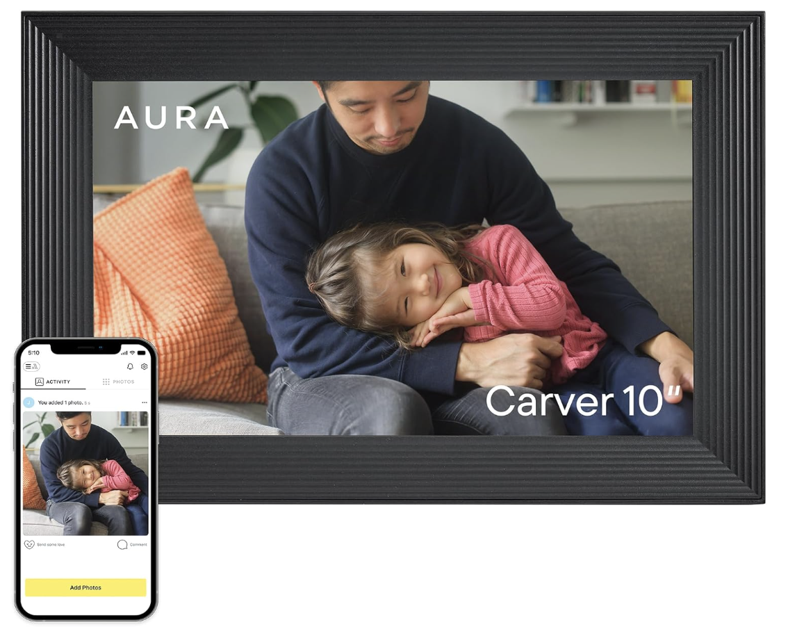 Aura Carver 10-inch digital photo frame displaying a father and daughter, shown beside the synced mobile app.