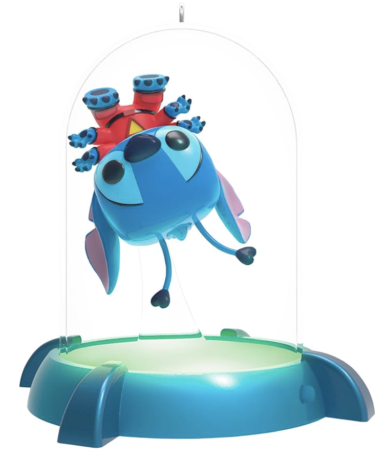 Stitch ornament inside a clear glass dome, featuring Stitch upside down in his red Experiment 626 suit.