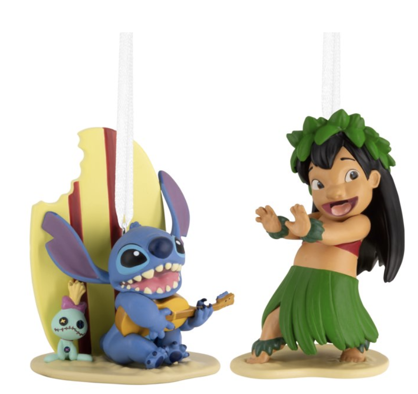 Lilo and Stitch Christmas ornament set featuring Lilo dancing in a hula skirt and Stitch playing ukulele beside a surfboard.