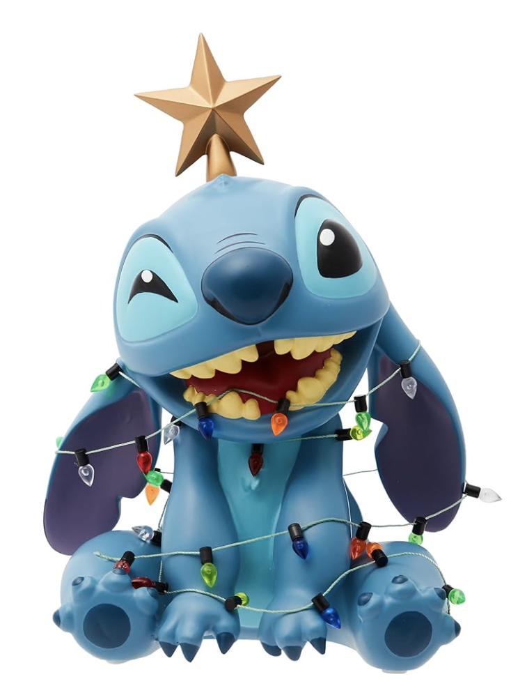 Stitch holiday figurine sitting with a gold star on his head and wrapped in colorful Christmas lights, perfect for Lilo & Stitch Christmas decor.