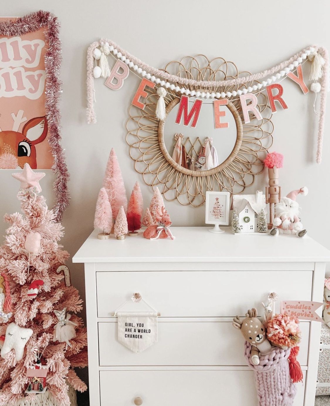 Kids' room decorated with pink Christmas trees, pastel bottle-brush trees, a 