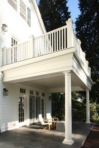 A Second-Story Balcony - Boost your curb appeal with these luxury exterior renovations, from grand front porches to stone siding and oversized double doors.