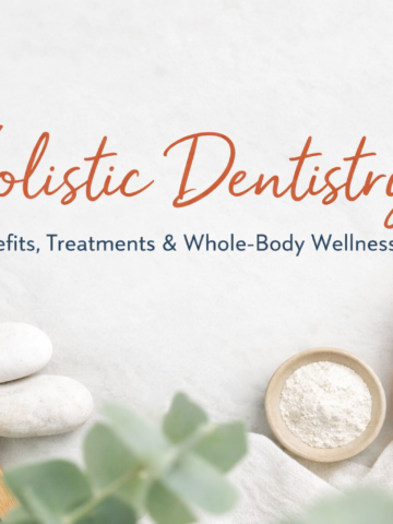 Natural holistic dentistry tools with bamboo toothbrush and wellness products representing non-toxic dental care