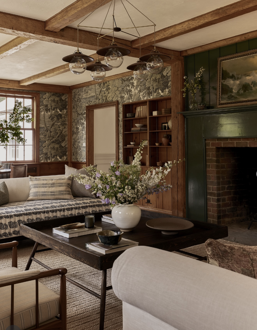 upgrade your home on a budget with a cozy living room featuring wood beams, warm textures, and timeless traditional decor
