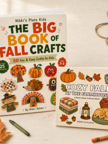 The Big Book of Fall Crafts and Cozy Fall at the Farmhouse displayed as realistic paperback books on an autumn craft table.