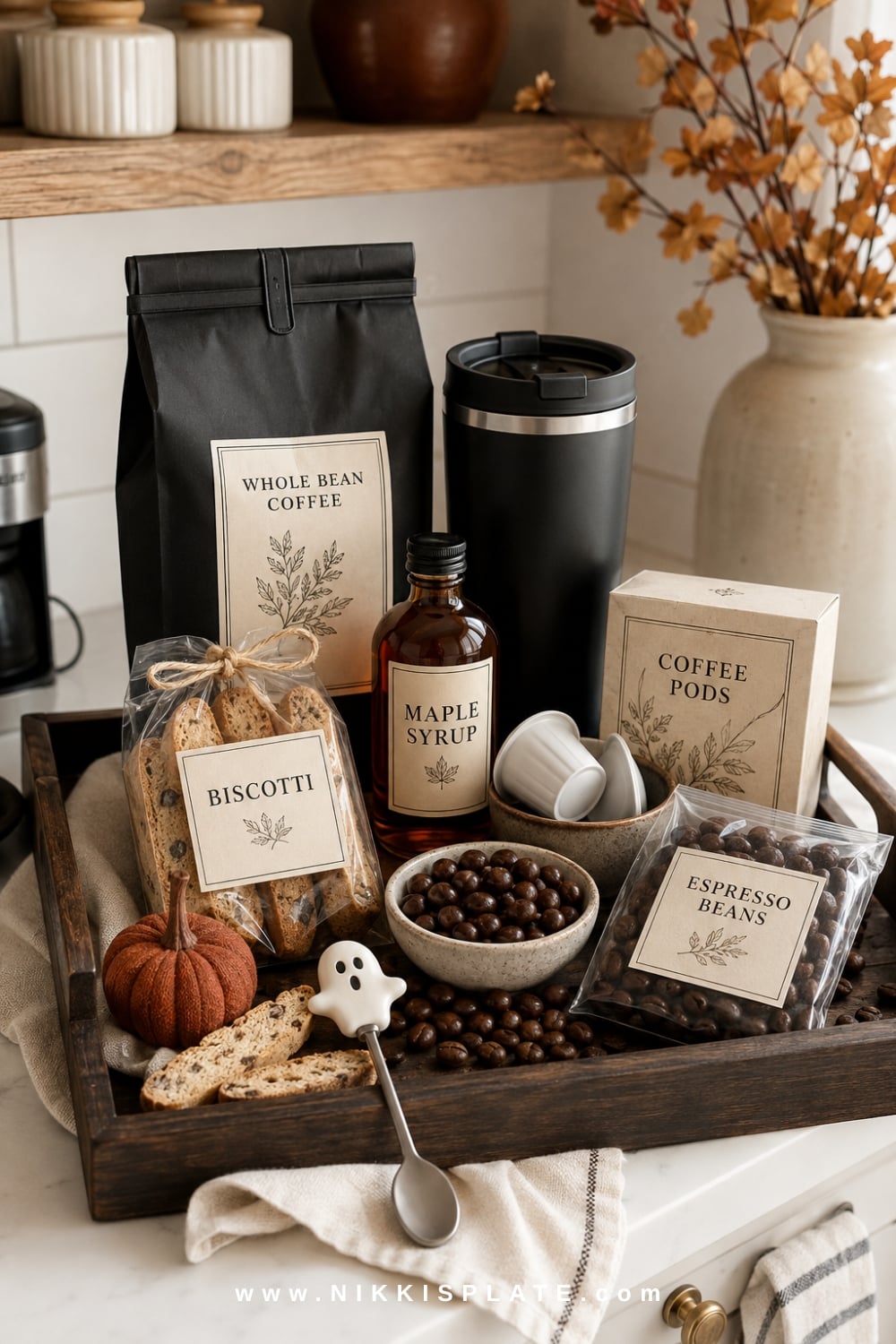 Coffee lover's boo basket for him with beans, a black travel mug, fall syrup, biscotti and chocolate treats.