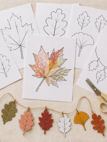 Free printable fall leaves displayed with crayons, scissors and finished paper leaf crafts.