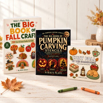The Big Book of Fall Crafts, The Big Book of Pumpkin Carving Stencils, and Cozy Fall at the Farmhouse displayed together on a light farmhouse table.